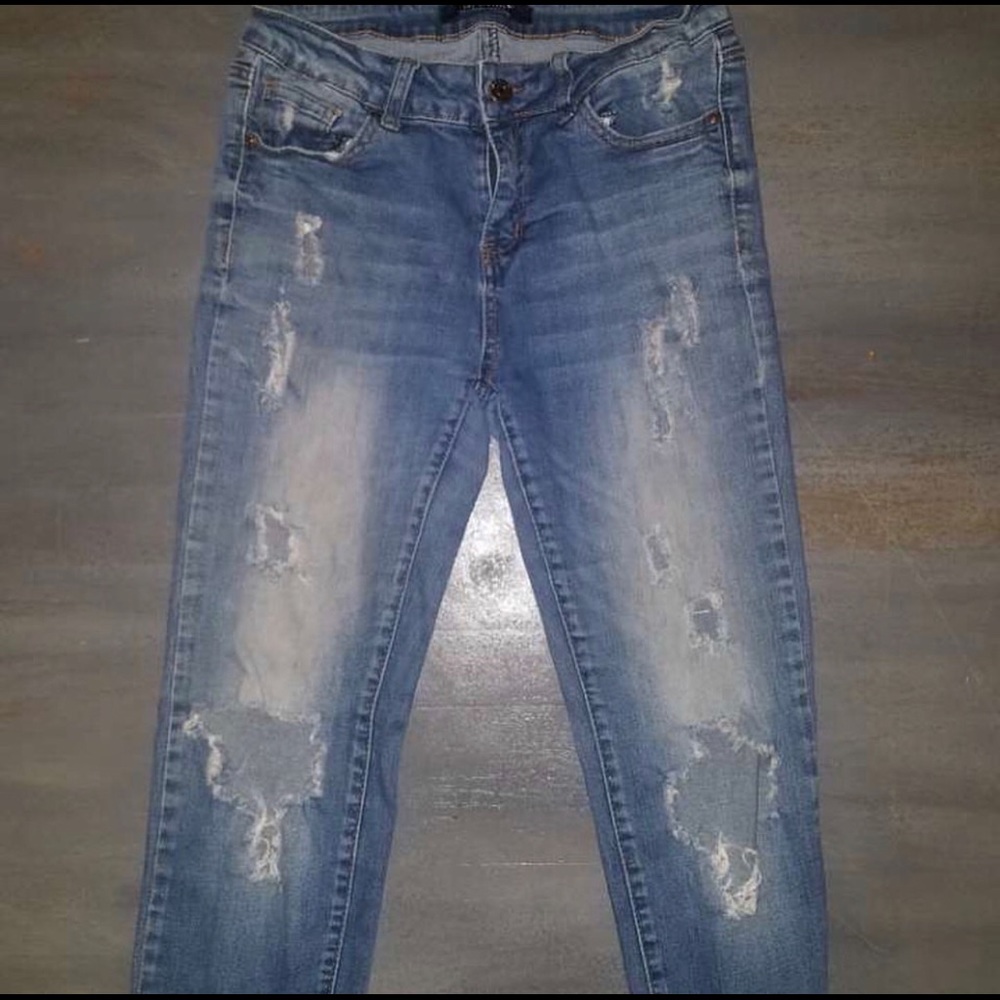 ripped mid rise jeans